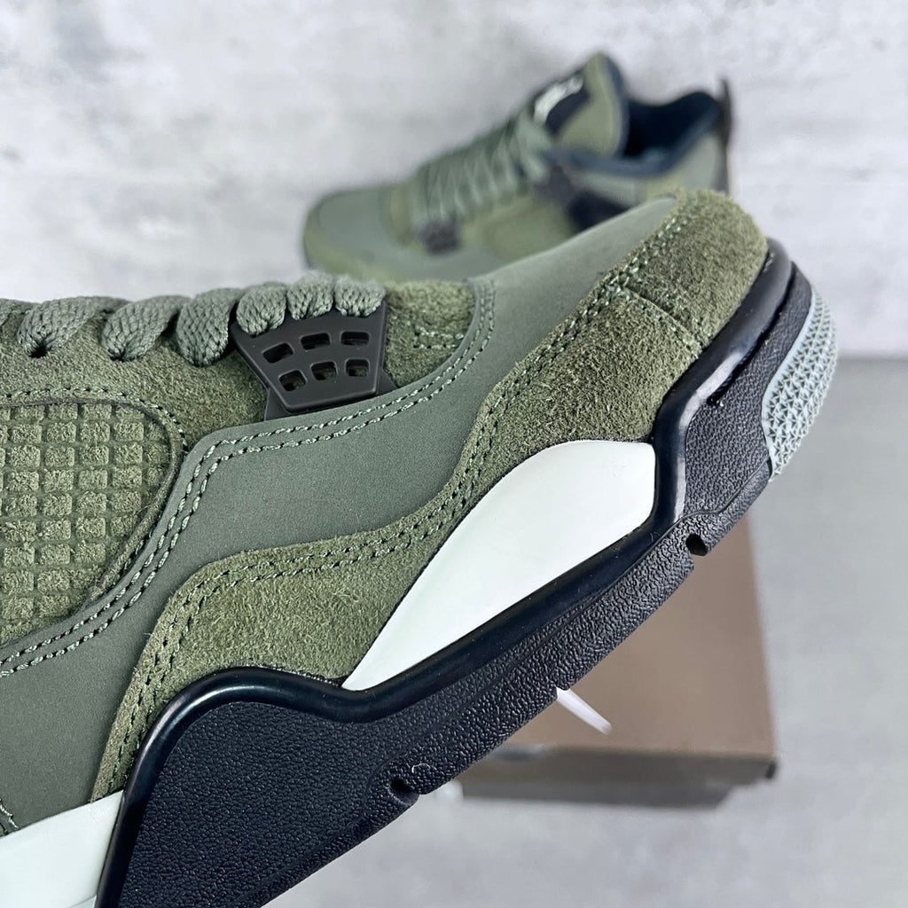 Olive suede high-top sneaker with dark navy lace wings and white midsole