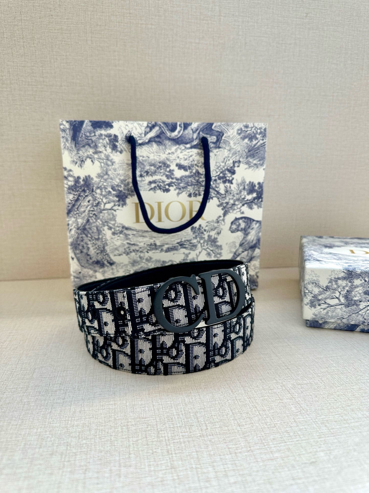 Dior belt in black-and-blue monogram fabric with dark round Dior buckle