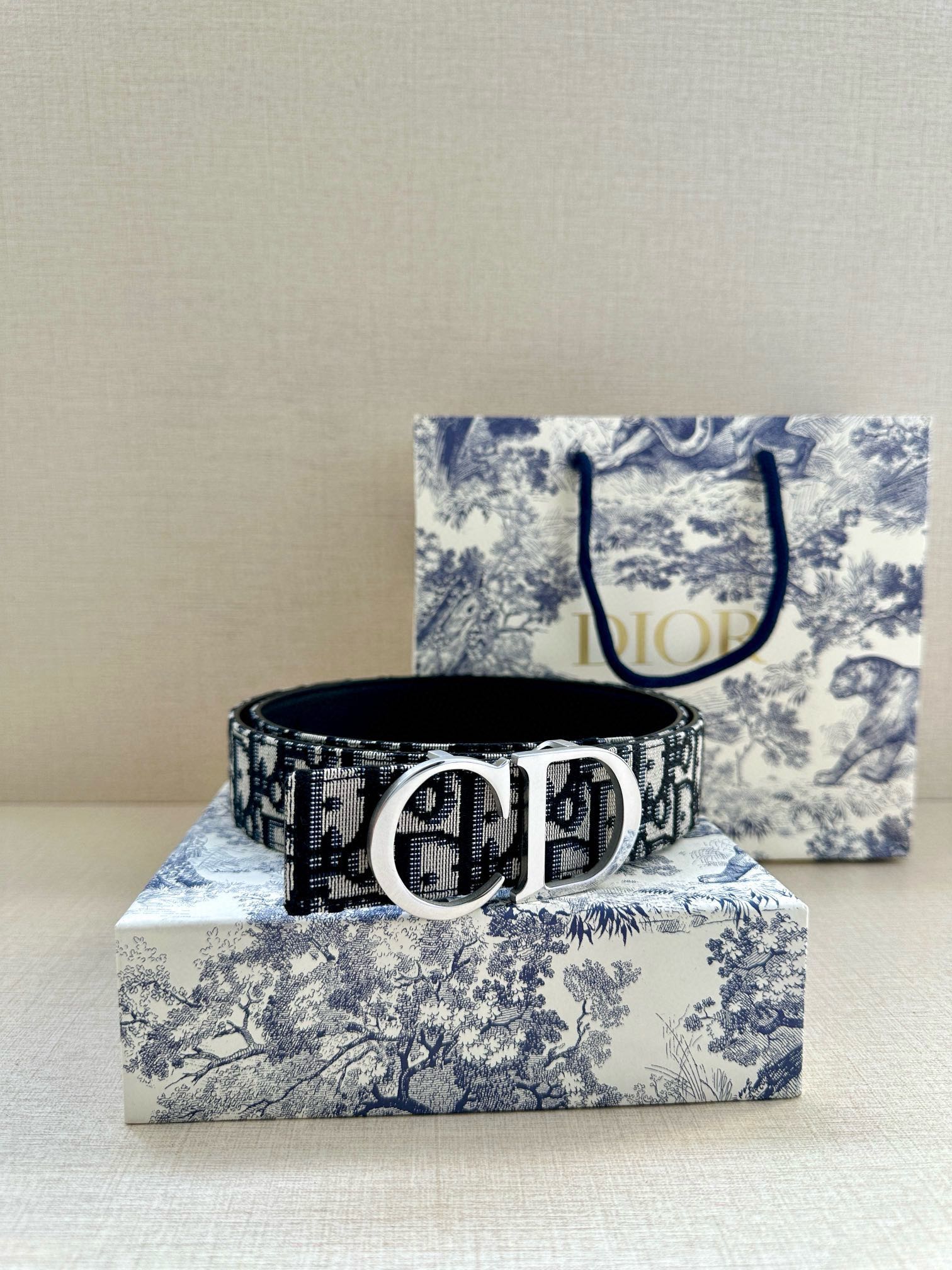 Designer belt with black Dior monogram jacquard strap and silver-tone buckle