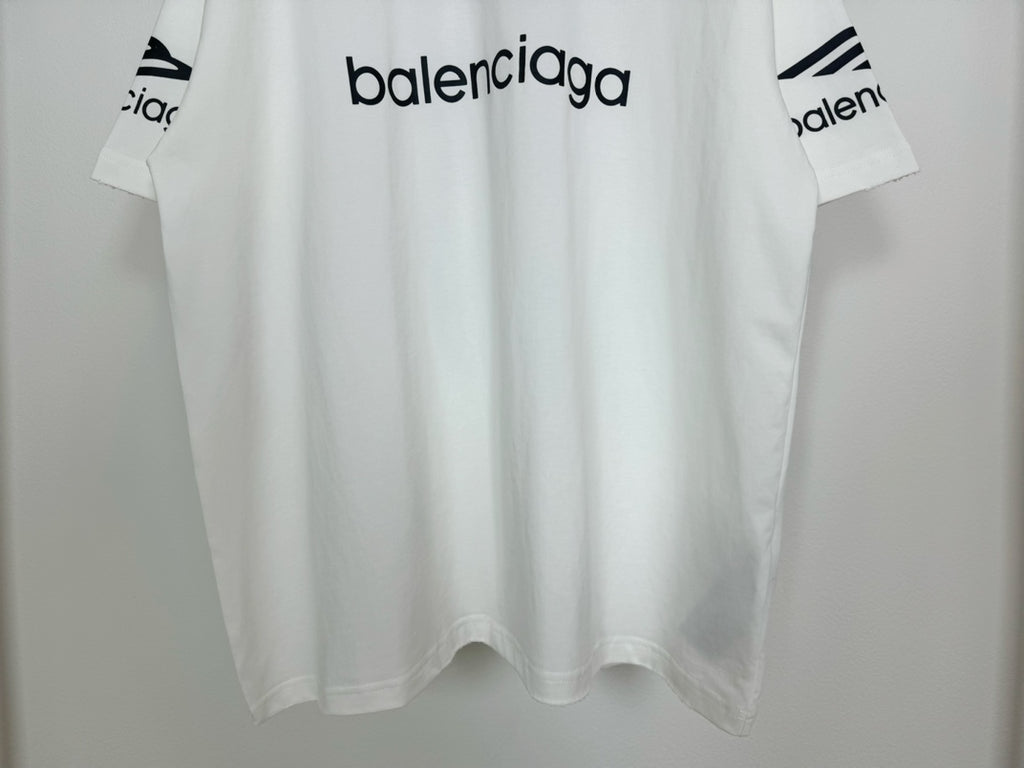 White Balenciaga T-shirt with 'balenciaga' wordmark on chest and curved hem