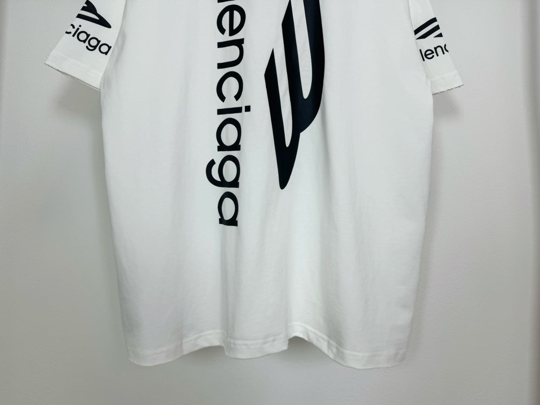 White Balenciaga T-shirt close-up of vertical 'balenciaga' logo on back