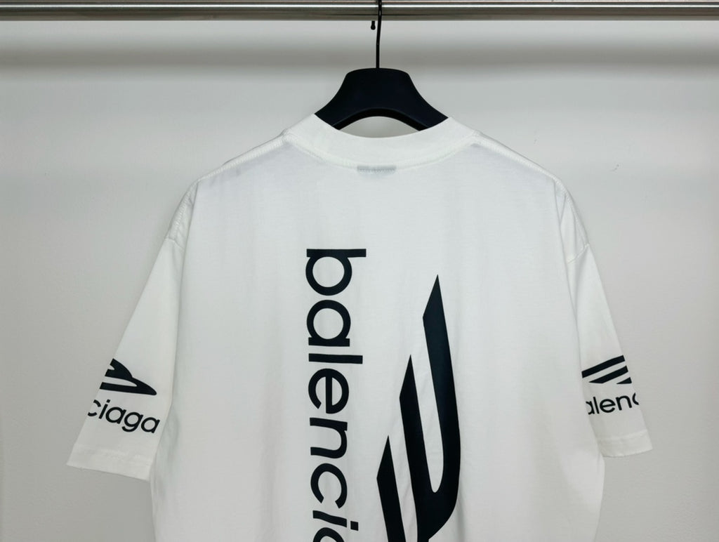 White Balenciaga T-shirt close-up of vertical 'balenciaga' logo and icon on back