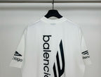 White Balenciaga T-shirt close-up of vertical 'balenciaga' logo and icon on back