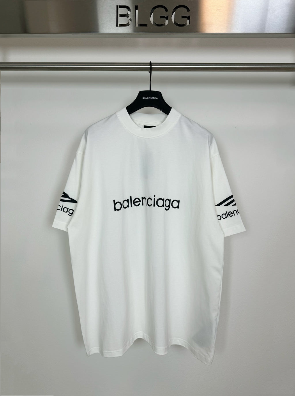 White Balenciaga short-sleeve T-shirt with centered 'balenciaga' logo print