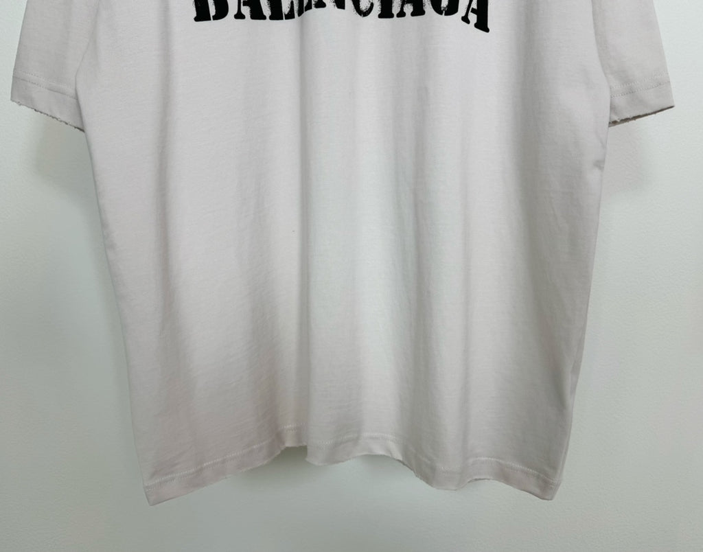 White short-sleeve T-shirt with black BALENCIAGA logo and straight hem