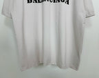 White short-sleeve T-shirt with black BALENCIAGA logo and straight hem