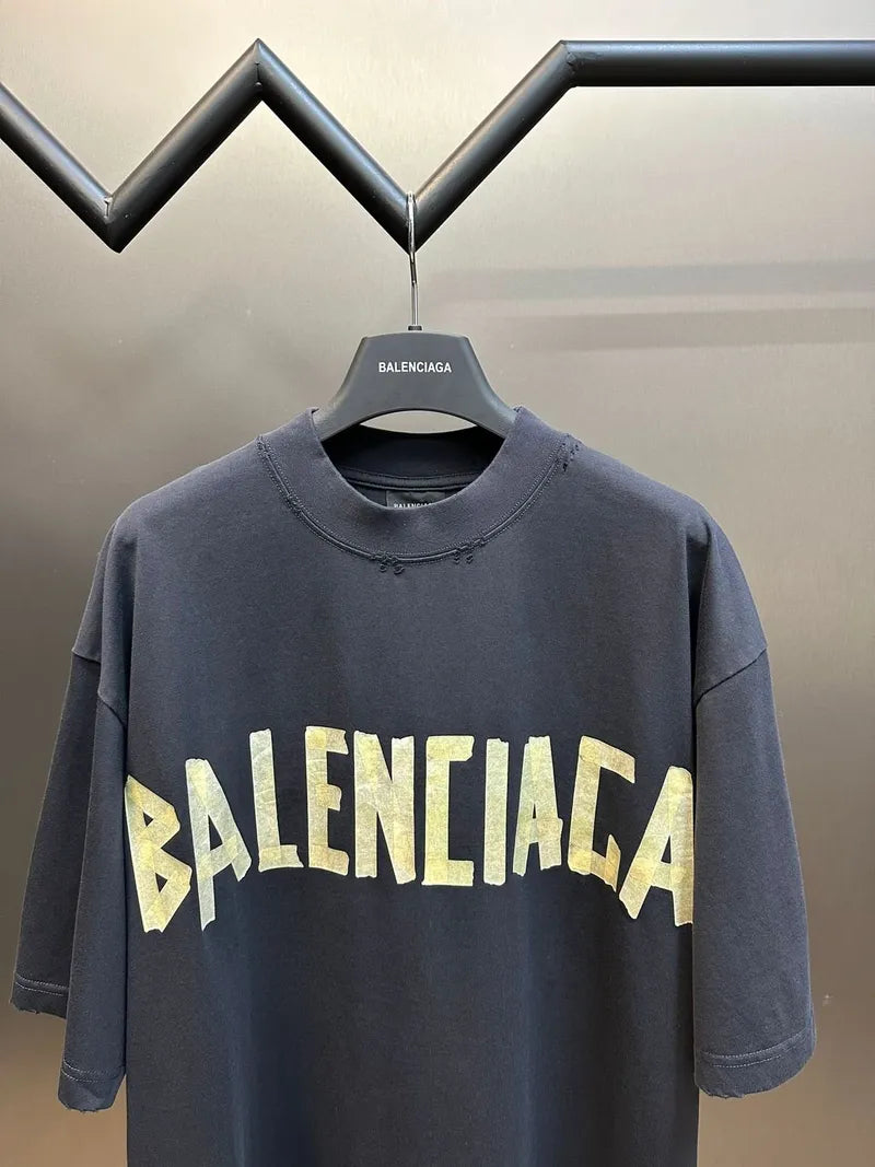 Navy Balenciaga short-sleeve t-shirt on hanger with front logo graphic