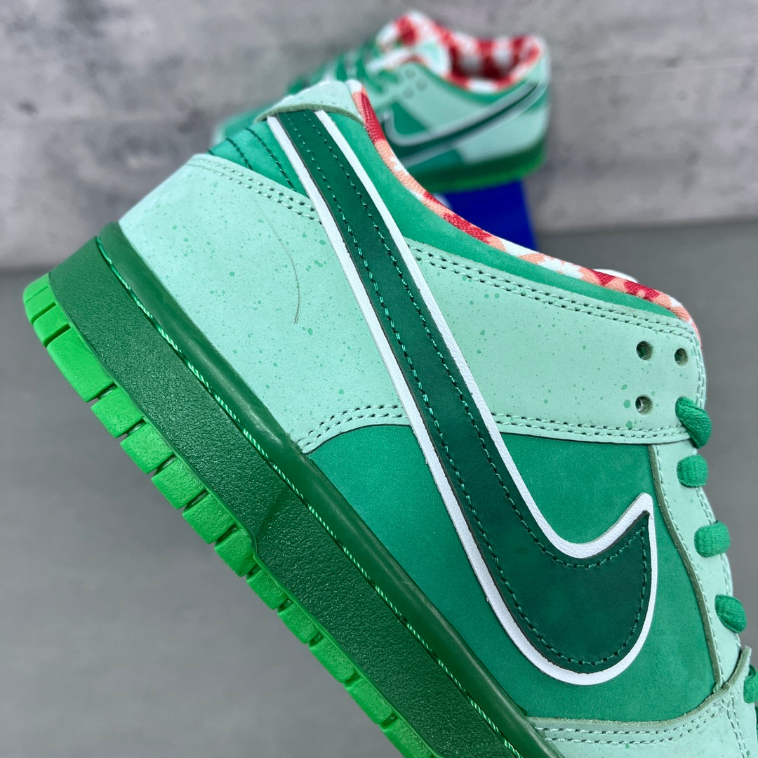 Seafoam and dark green sneaker with white mid panel and green outsole tread