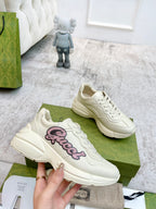 Gucci unisex sneakers, cream with pink script logo and thick platform sole
