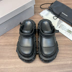 Clog-style sandals with perforated uppers and chunky tread sole, dark gray/black