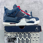 Blue basketball sneaker with red laces, white outsole, and patterned quarter panels