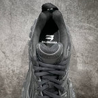 Balenciaga sneaker tongue with BALENCIAGA logo and black mesh lining