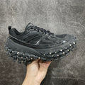 Balenciaga unisex sneaker in dark leather with black laces and silver-studded sole