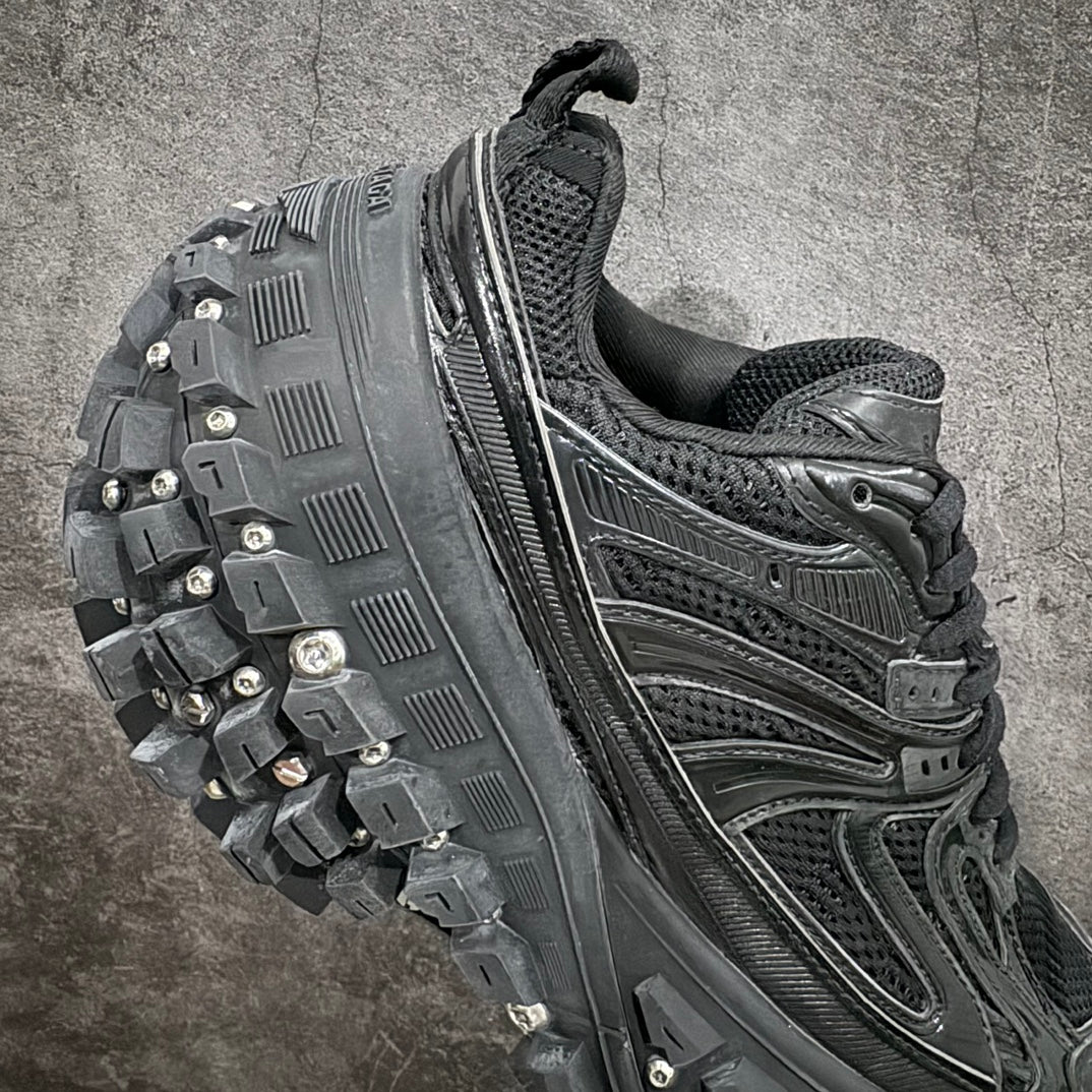 Balenciaga sneaker outsole with chunky tread and metal studs