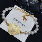 Gold heart charm pearl-bead bracelet with chain and CHANEL logo tag