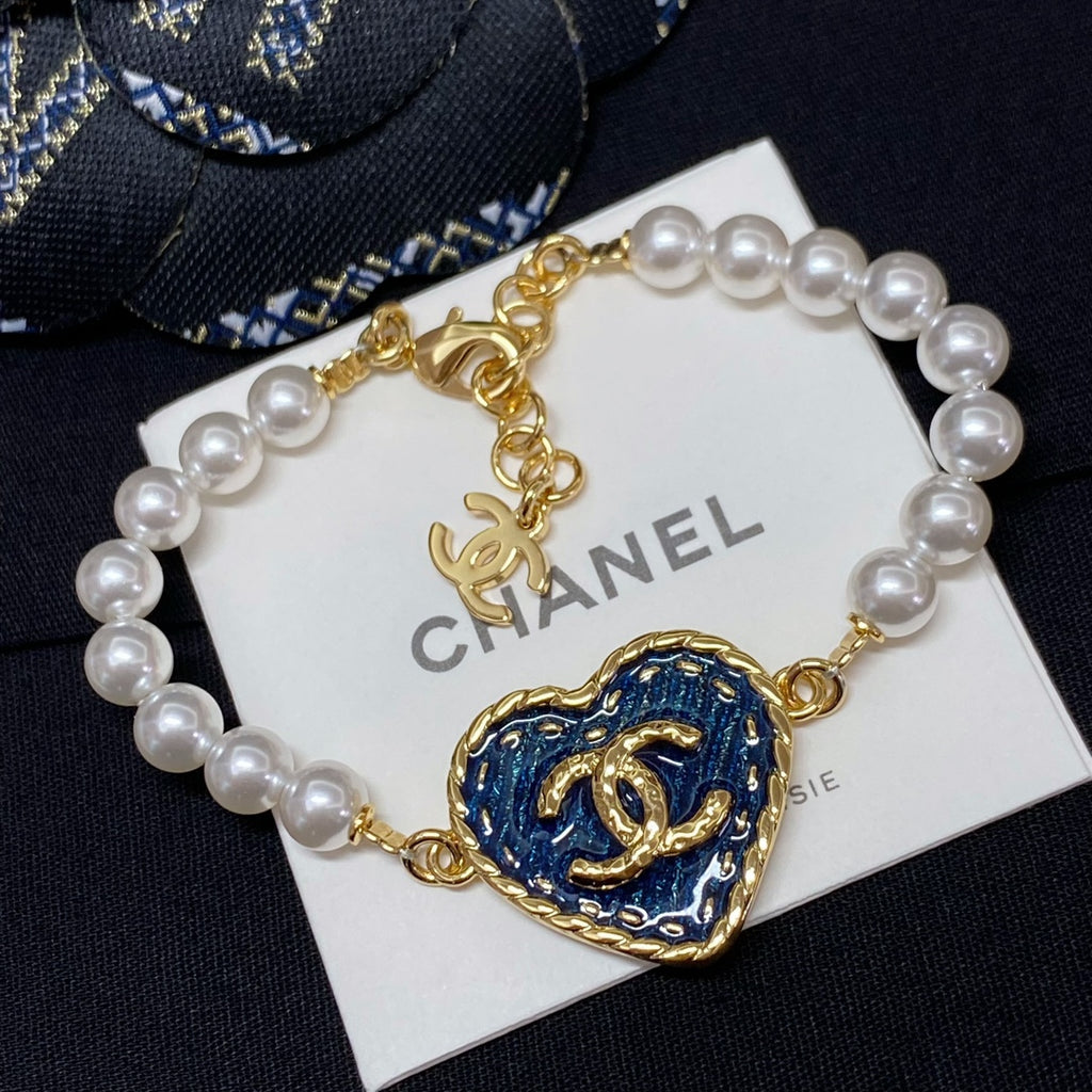 Blue heart charm pearl-bead bracelet with gold links and CHANEL logo card