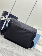 Prada shoulder bag with long strap, matte finish, and front flap side view