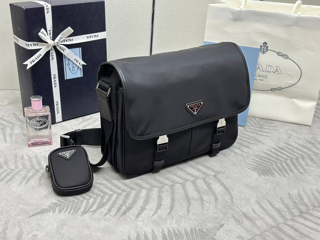 Prada crossbody bag with detachable mini pouch and front flap; black hardware