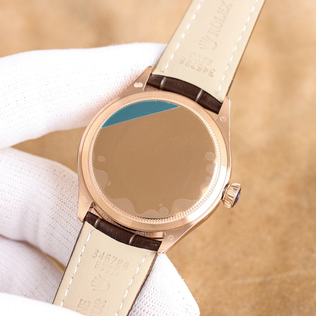 Cellini wristwatch caseback with engraved back and brown leather strap