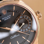 Cellini wristwatch close-up with black dial, rose-gold bezel, and gold-toned hands