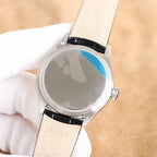 Rolex wristwatch caseback with light leather strap, engraved markings and blue-tinted insert