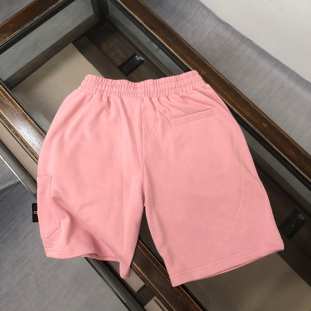 Stone Island pink drawstring shorts with front pockets and relaxed fit