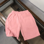 Stone Island pink drawstring shorts with front pockets and relaxed fit