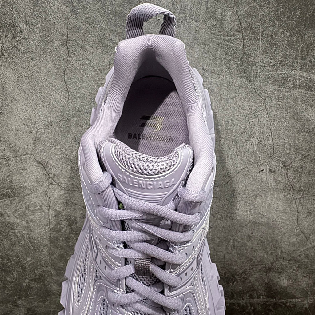 Lilac sneaker inside heel showing BALENCIAGA logo near the collar
