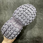 Lilac sneaker outsole view with deep rectangular traction lugs