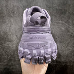 Back view of lilac sneaker with BALENCIAGA logo and chunky tread sole