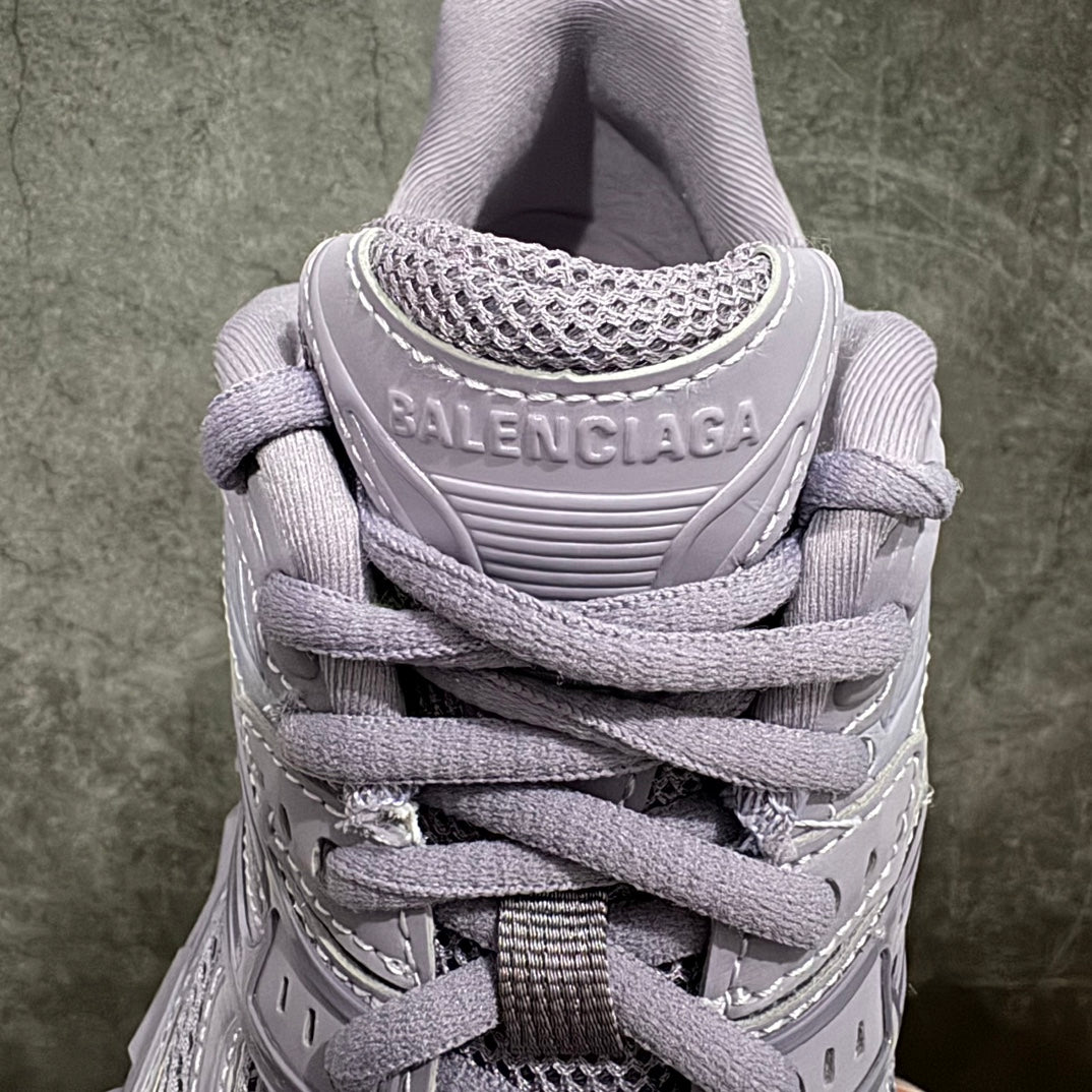 Lavender Balenciaga lace-up sneaker back view with logo patch and mesh collar