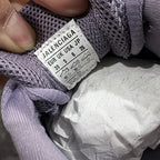 Lavender Balenciaga sneaker with size tag label on mesh upper and laces