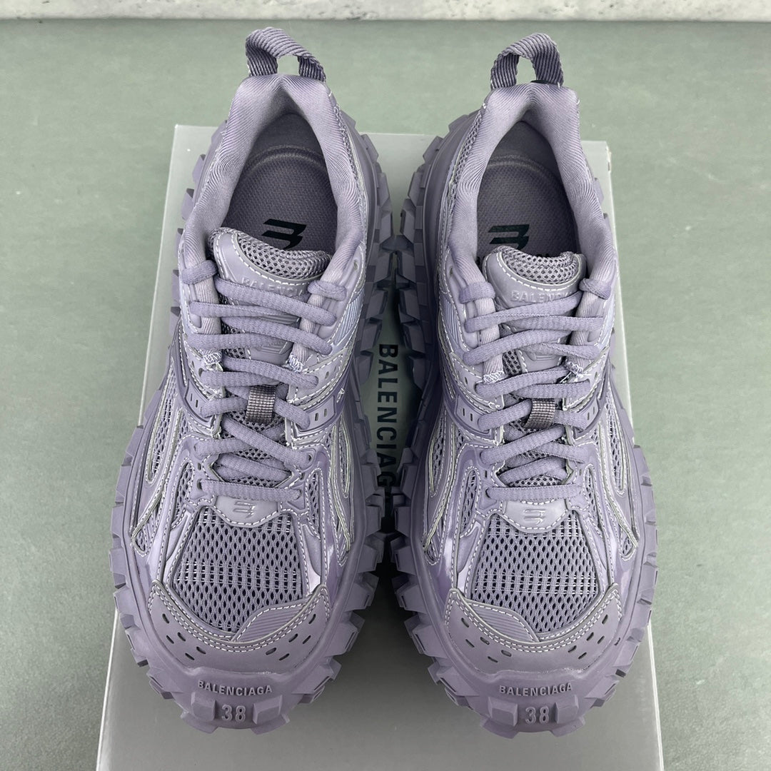Lavender sneakers side view with lace-up closure and grippy tread sole