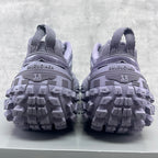 Lavender sneaker heels with Balenciaga logo and 38 marking; tread pattern visible