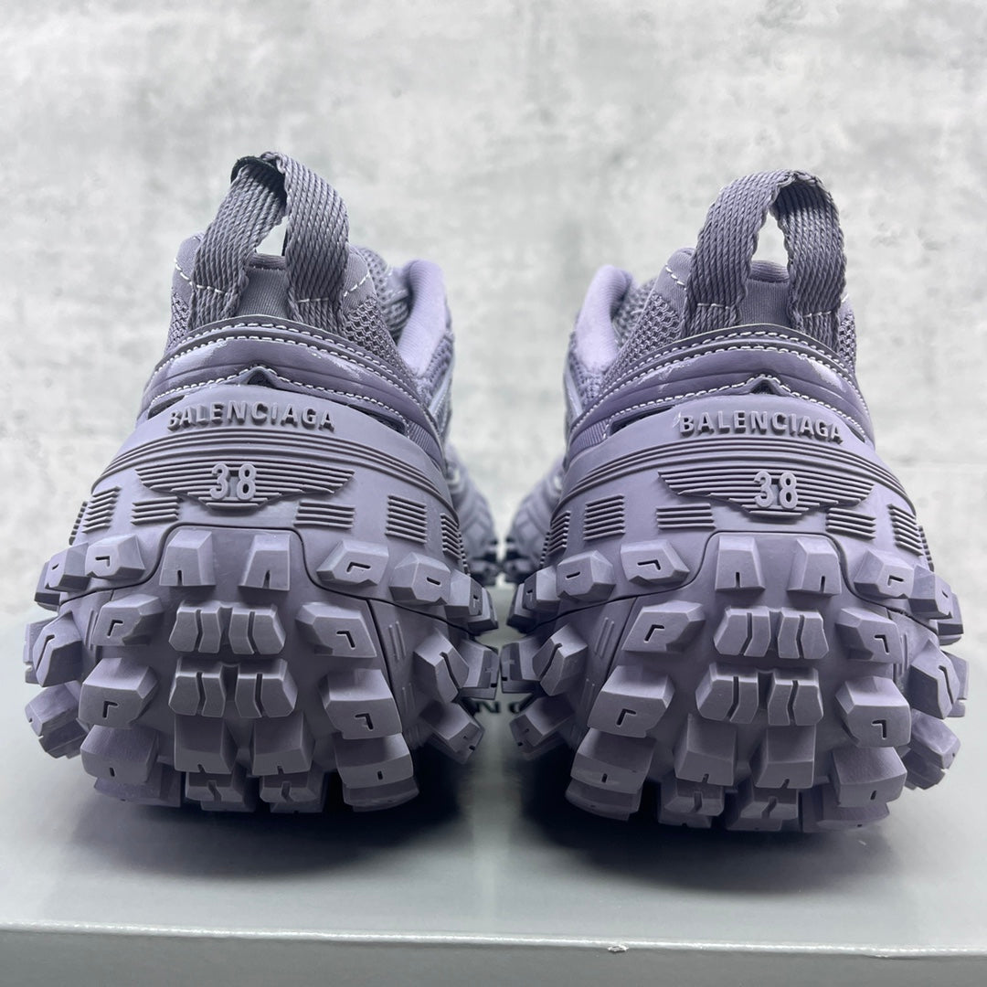 Lavender sneaker heels with Balenciaga logo and 38 marking; tread pattern visible