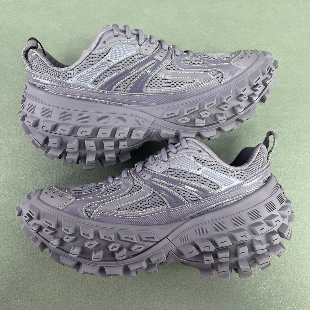 Lavender lace-up chunky trail sneakers with perforated mesh upper and deep tread sole