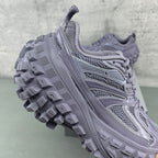 Lavender lace-up trail sneaker with textured side panels and rugged tread sole
