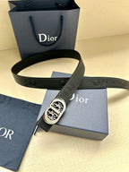 Dior belt with dark leather strap and silver-tone oval monogram buckle