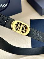 Dior belt with dark leather strap and gold-tone engraved oval buckle