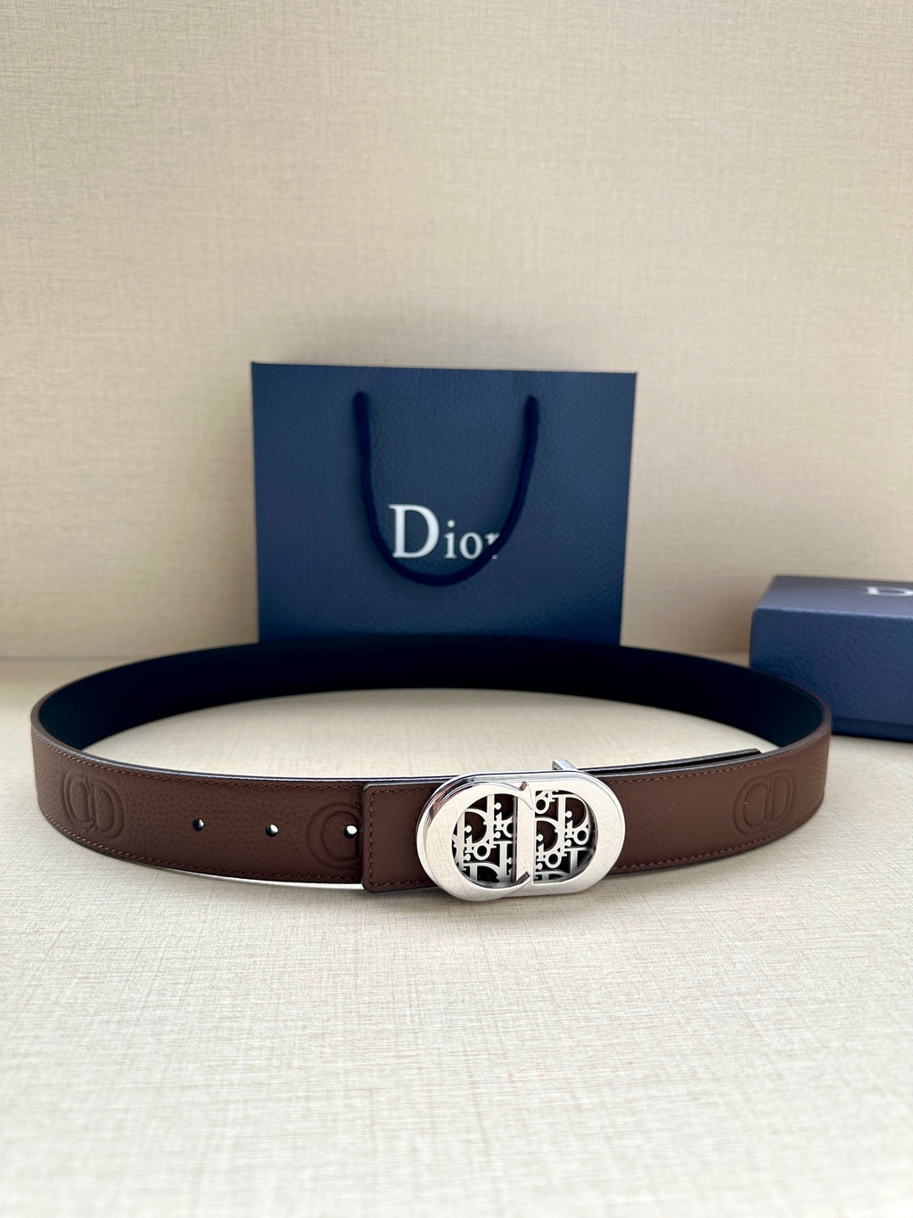 Dior leather belt in brown with silver-tone oval buckle