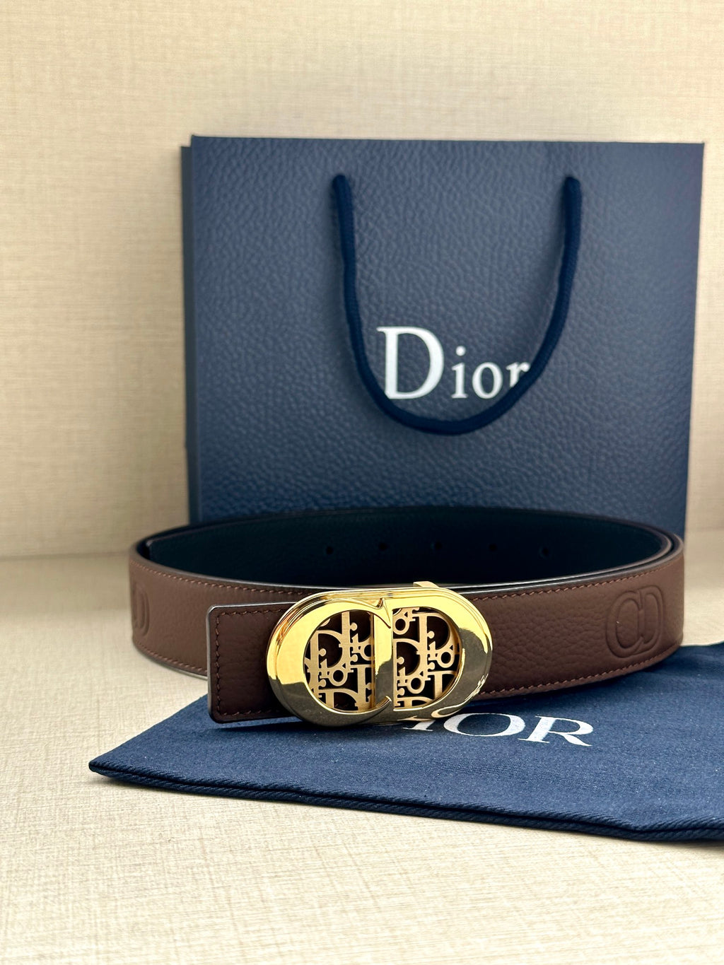 Dior leather belt in brown with gold-tone oval buckle
