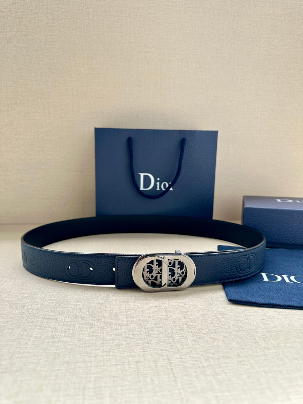 Dior leather belt, dark blue, with silver-tone logo buckle and prong holes