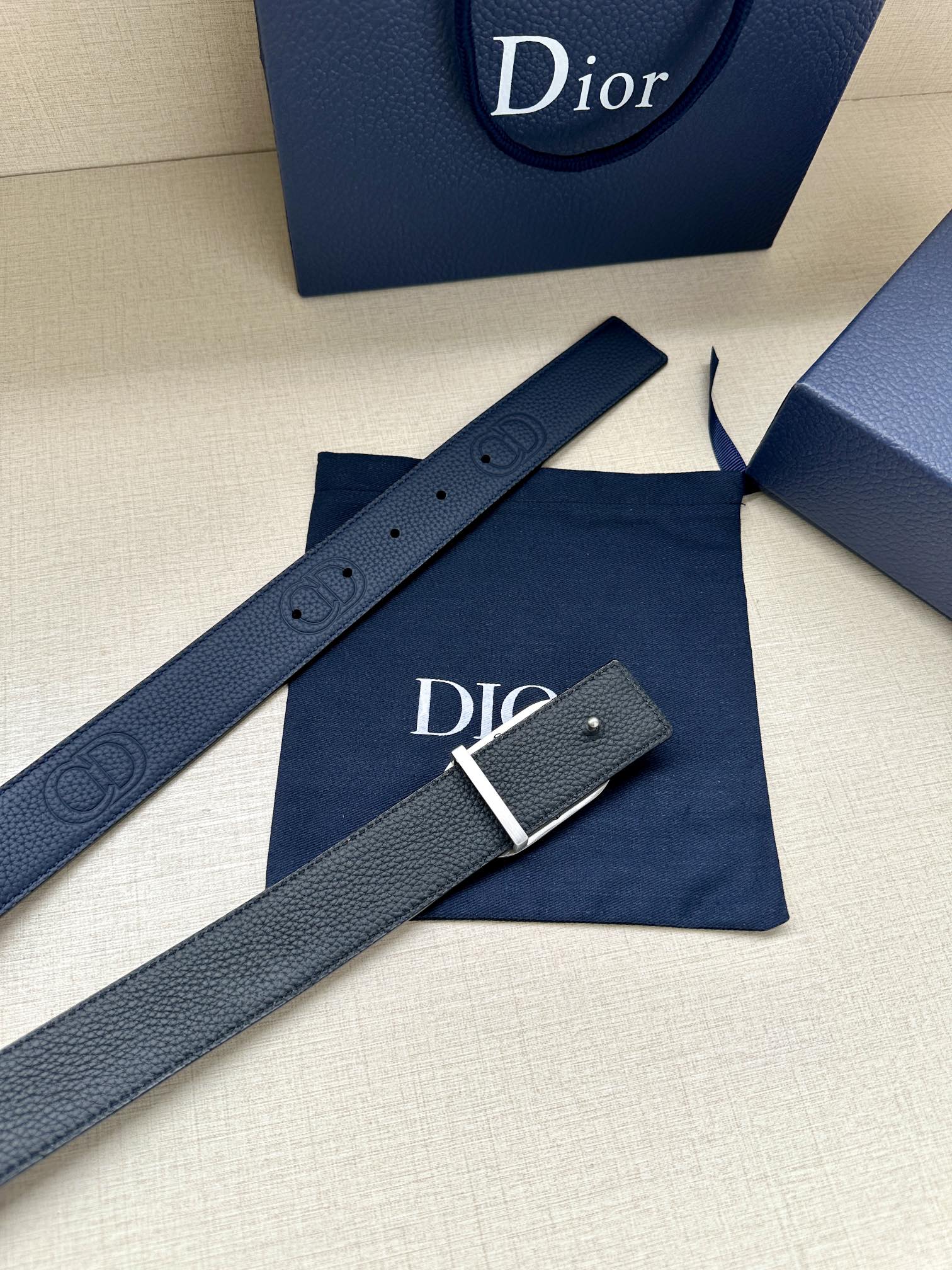 Dior leather belt, dark blue, with silver-tone buckle and stitched strap edges