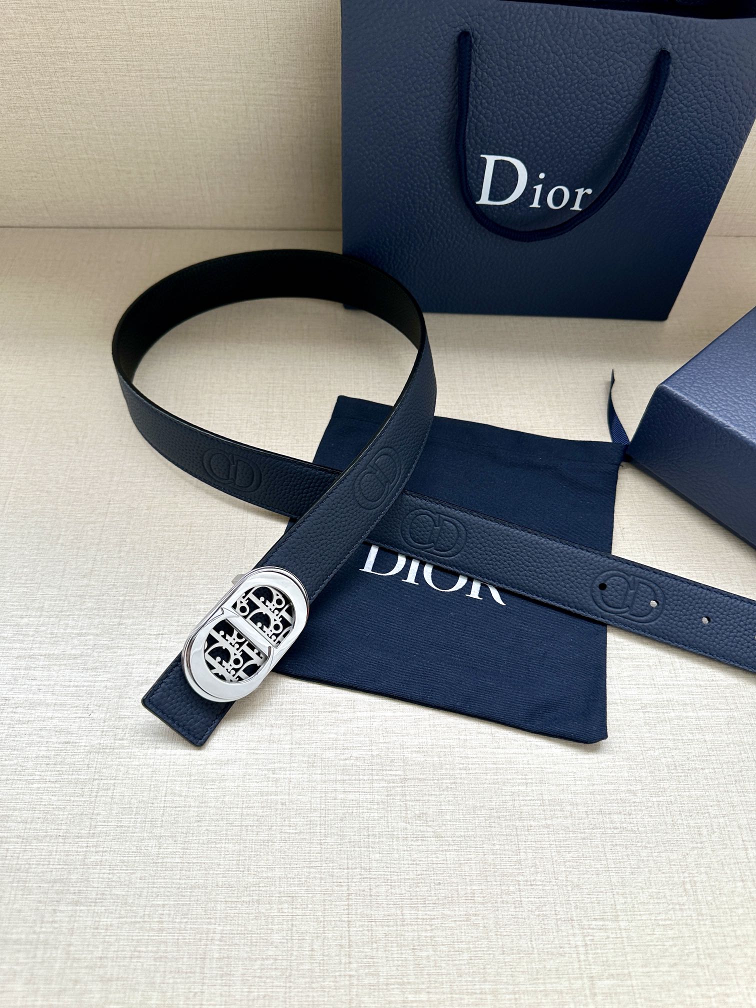 Dior leather belt, dark blue, with silver-tone logo buckle and adjustable tab