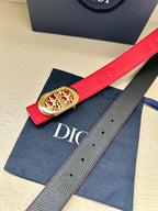 Red leather belt with gold-tone logo buckle, on blue dust bag