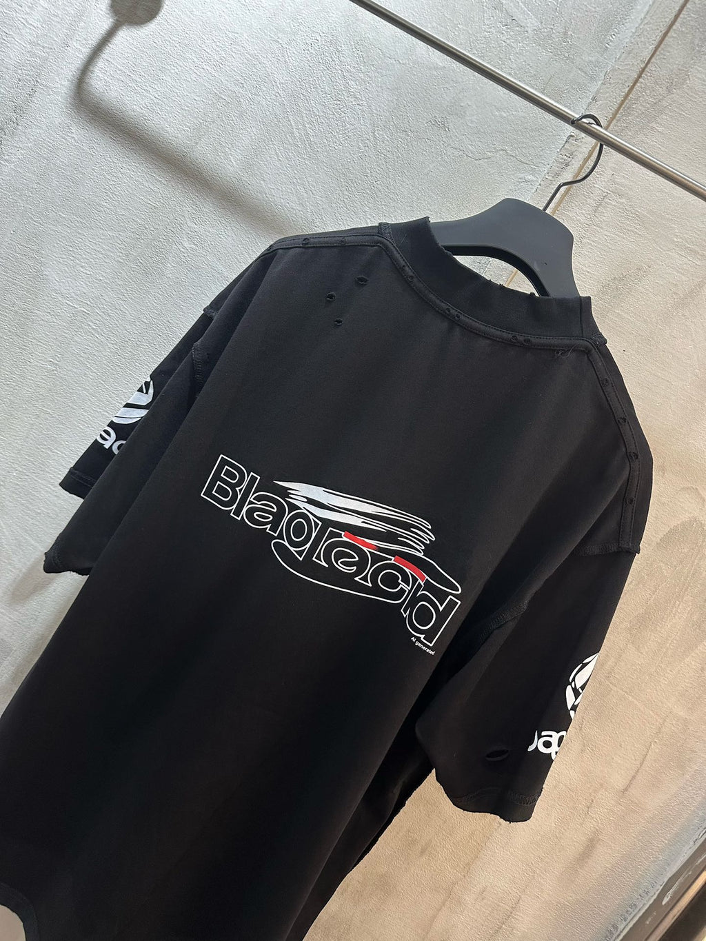 Short-sleeve T-shirt, black with white back logo print and partial sleeve logo