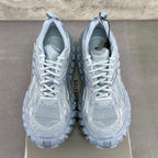 Light gray Balenciaga sneakers heel and toe pair, lace-up with padded collar