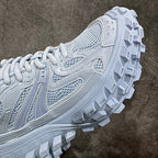 Light blue platform sneaker, close-up of side panels and deep lug outsole