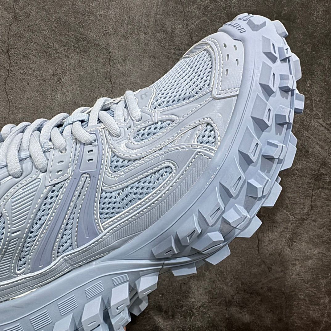 Light blue platform sneaker, close-up of side panels and deep lug outsole