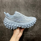 Light blue mesh-and-leather platform sneaker with chunky white tread sole